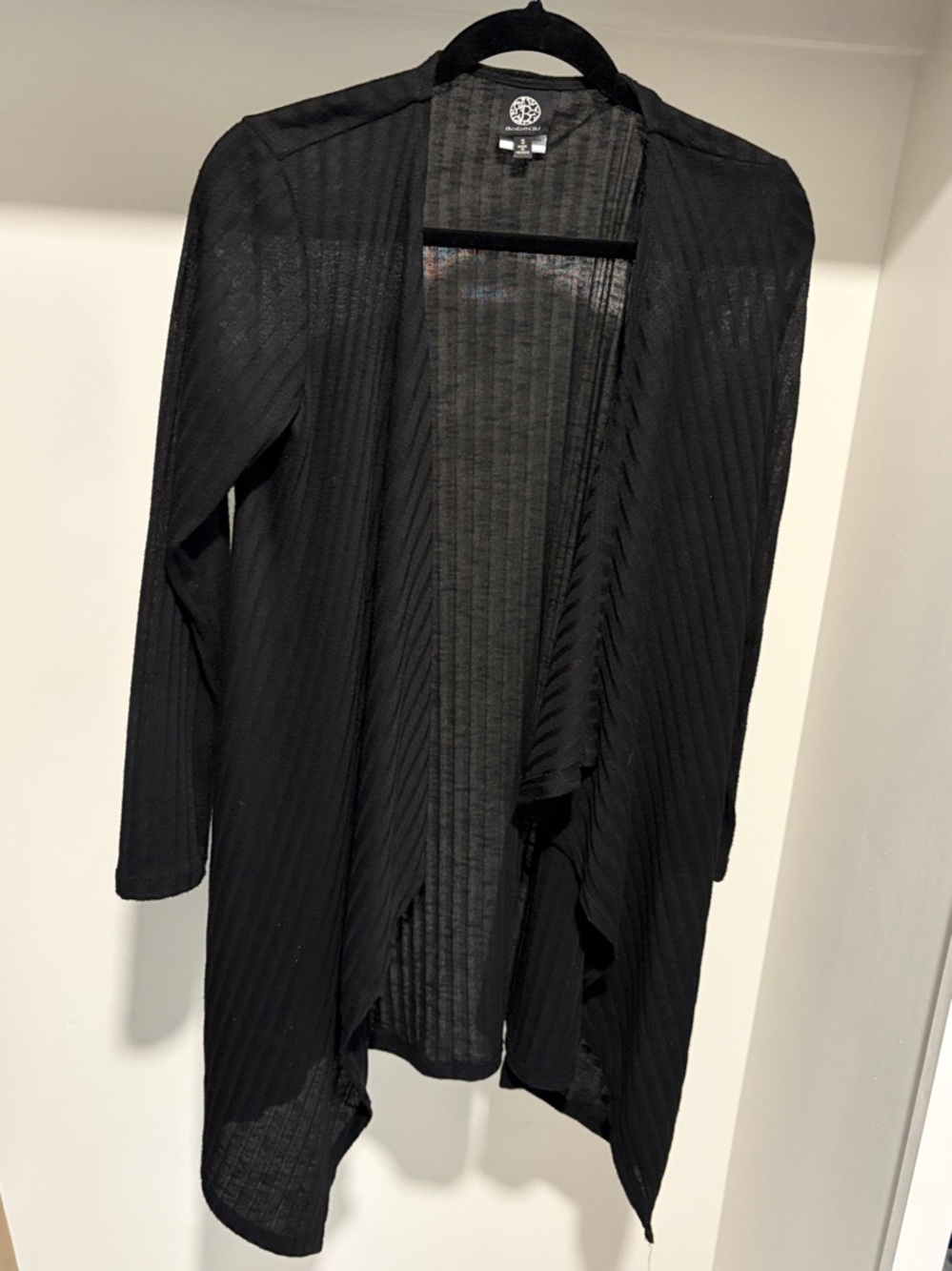 Women’s long sleeve cardigan sweater
 size small 
brand is BOBEAU